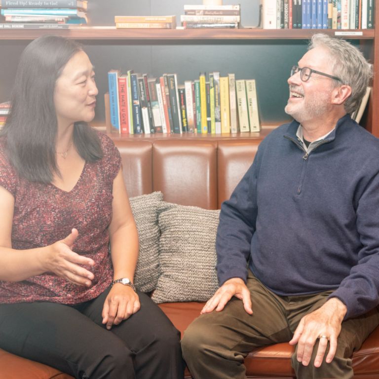 Eunice and Mark talking with each other.