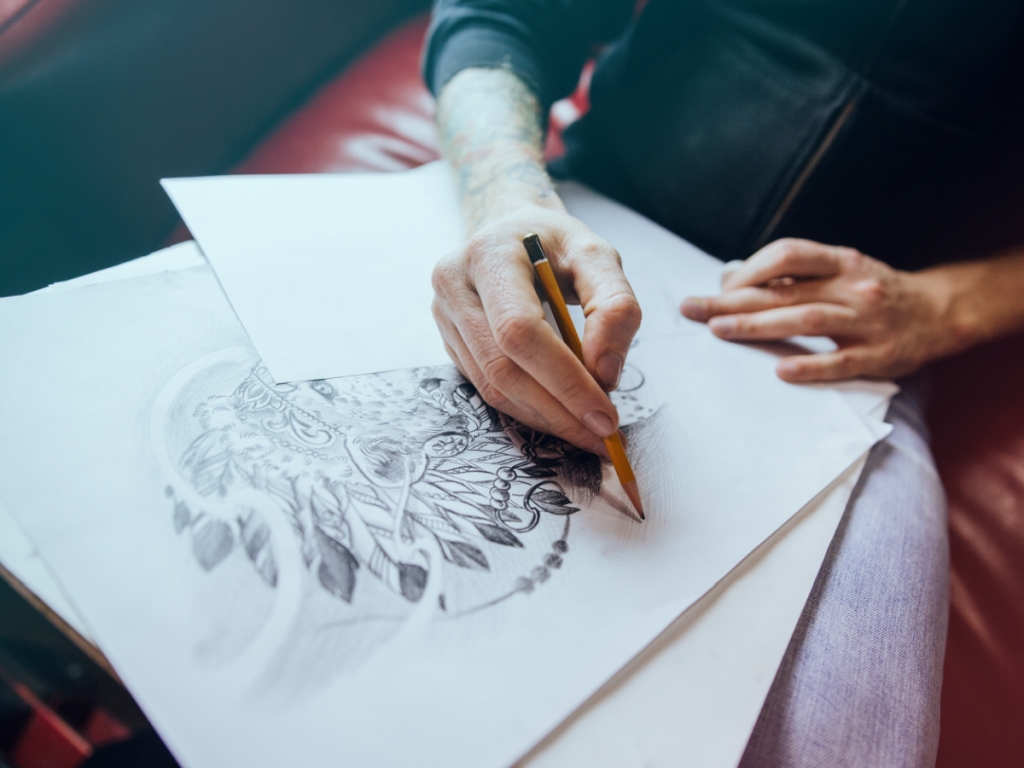 A person drawing.