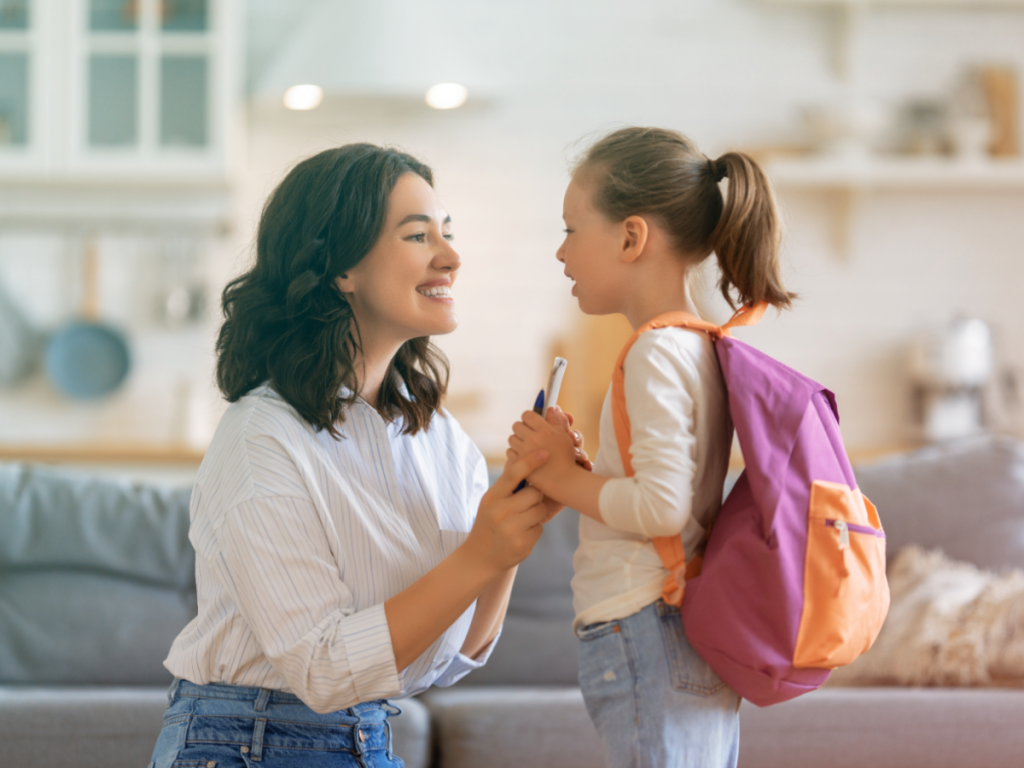 Mother and daughter getting ready for school.