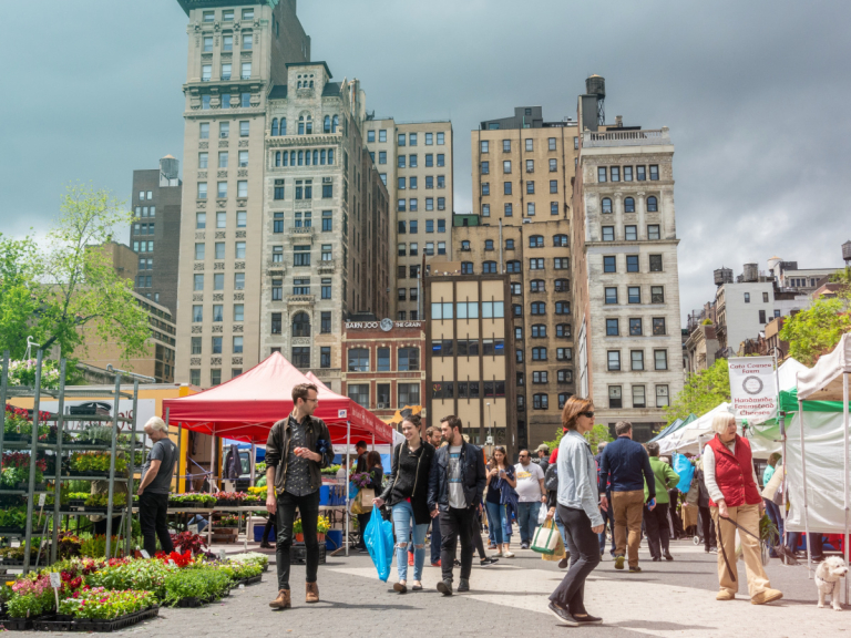 People walking at the farmers' market.